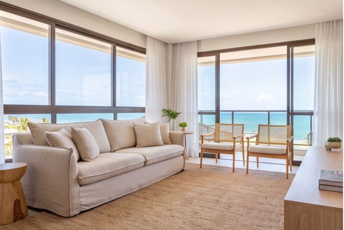 Apartamento pé na areia em Muro Alto com vista para o mar — sala