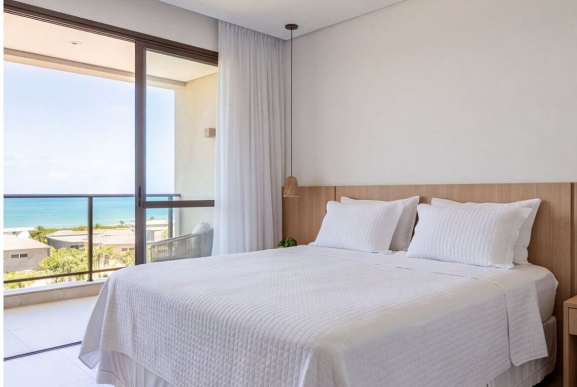 Apartamento pé na areia em Muro Alto com vista para o mar — quarto